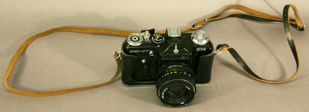 A ZENIT EM OLYMPIC CAMERA with Helios-44m 2/58 lens and part leather case. Used condition^