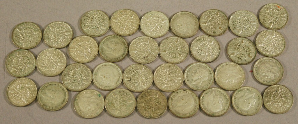 A COLLECTION OF THIRTY FOUR SILVER THREEPENNY COINS, dates 1931 x 2, 1932 x 5, 1933 x 10, 1934 x 10