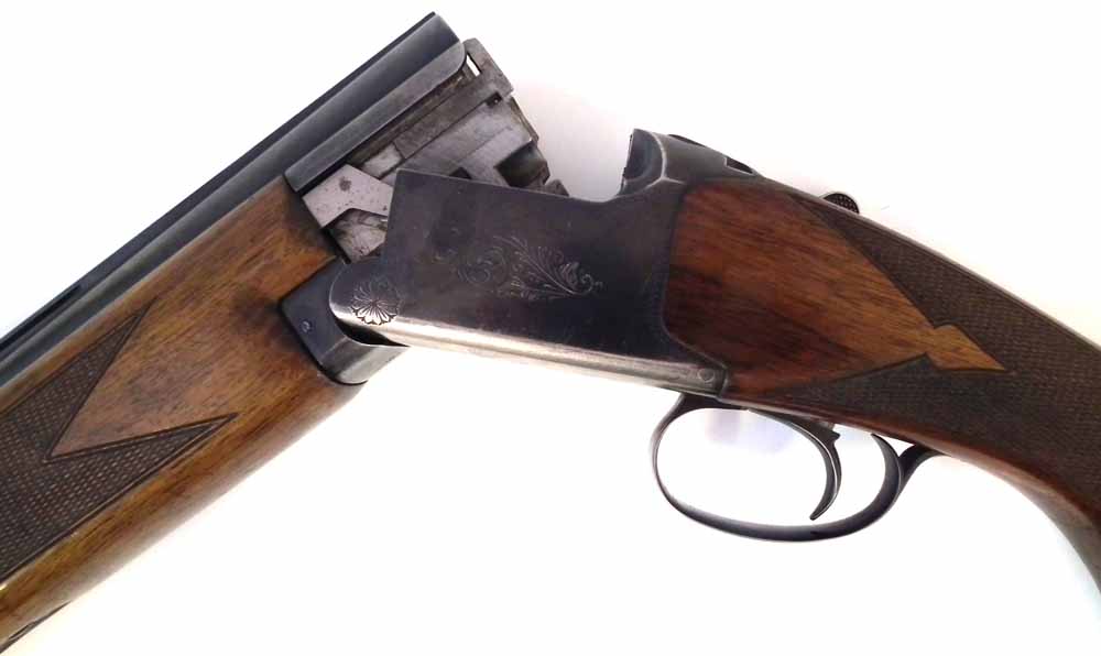 Browning 12 bore over and under shotgun  serial number 73J05799, with 26.25" barrels choked to three - Image 10 of 12