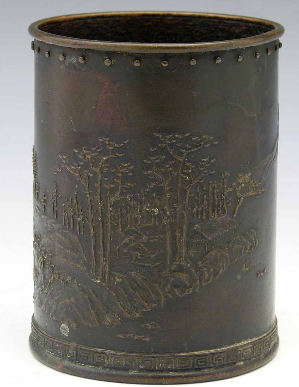 Chinese bronze brush pot, 19th century, the cylindrical body decorated with mountains and trees,