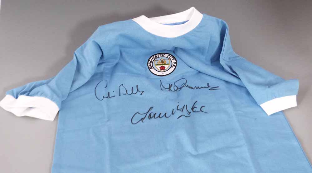 Score Draw Manchester City replica shirt signed by Colin Bell, Mike Summerbee and Francis Lee