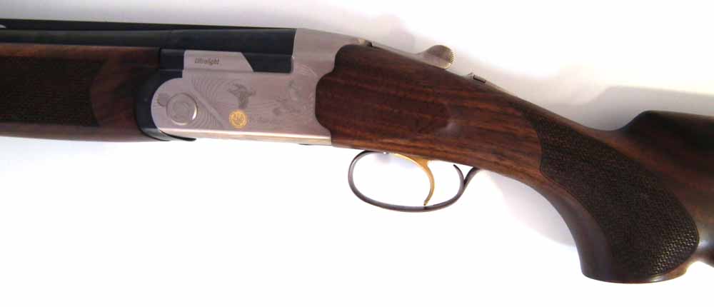 Beretta Ultra light 12 bore over and under shotgun,  serial number U70413B, with multi choke 71cm - Image 7 of 12