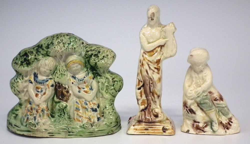 Two Creamware Pratt colour figures and a figure group circa 1800   the tallest figure measures