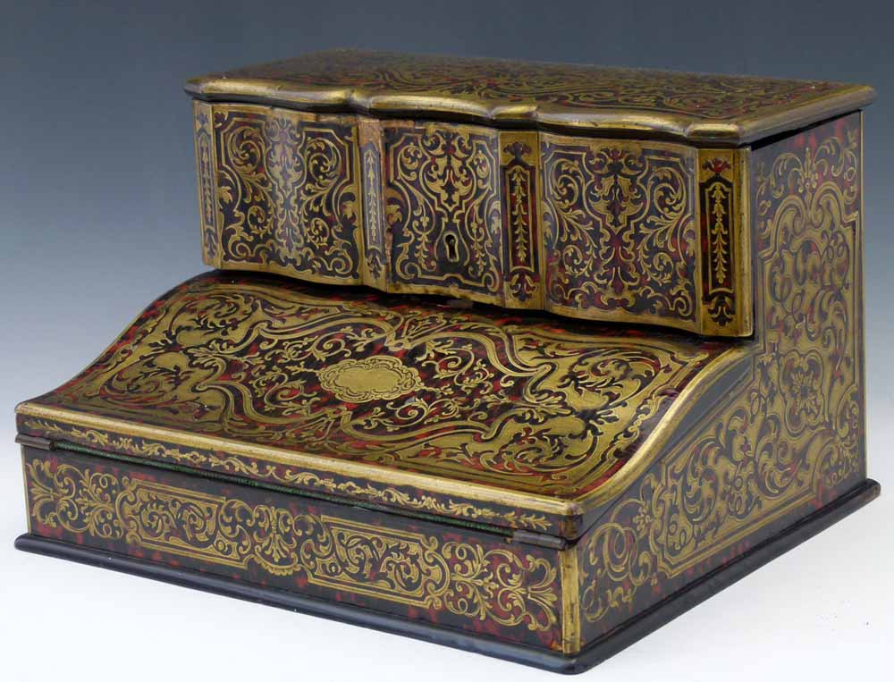 Boulle type cut brass and tortoishell lacquer table-top writing box, late 19th century, the raised