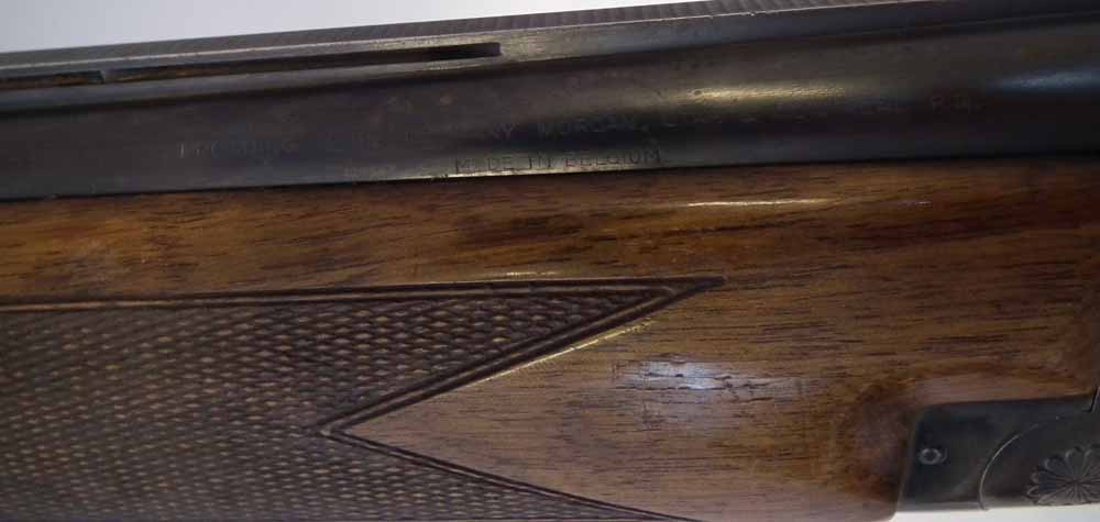 Browning 12 bore over and under shotgun  serial number 73J05799, with 26.25" barrels choked to three - Image 11 of 12