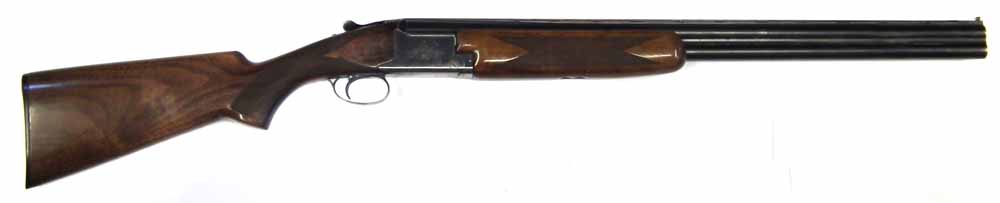 Browning 12 bore over and under shotgun  serial number 73J05799, with 26.25" barrels choked to three