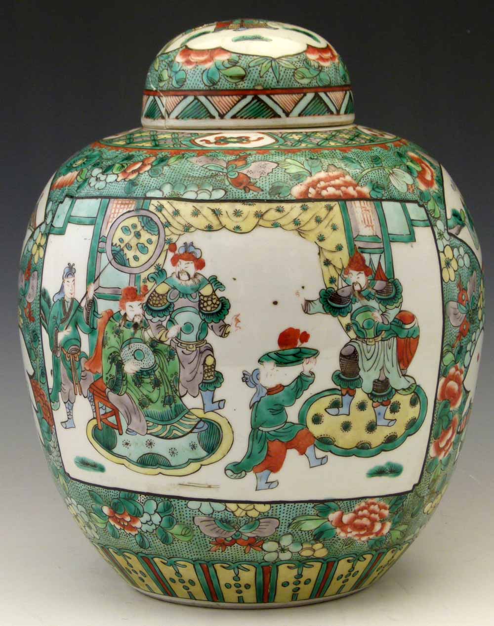 Chinese famille verte lidded jar, 19th century, painted on the floral ground with panels of