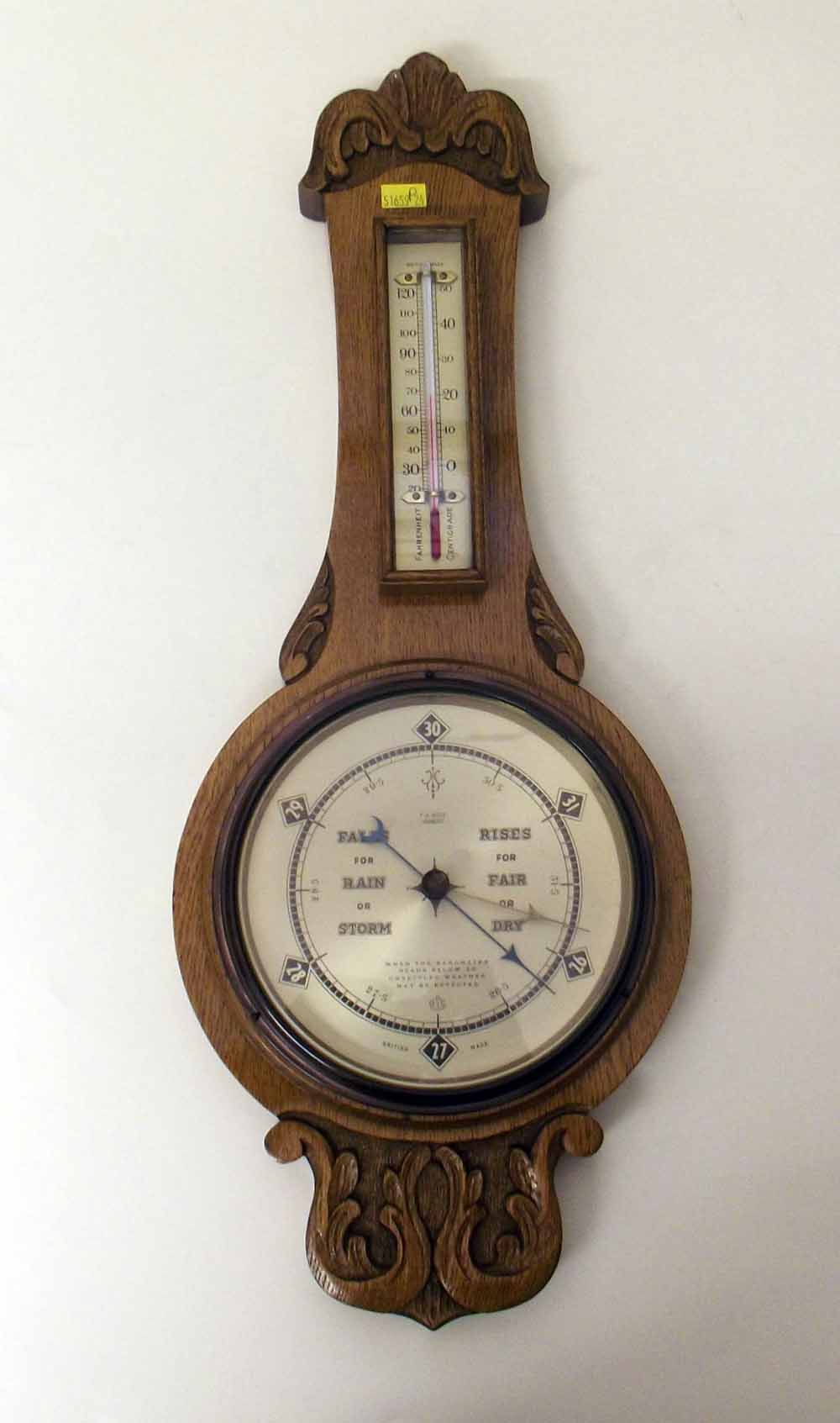 Edwardian oak aneroid barometer. Condition report: see terms and conditions