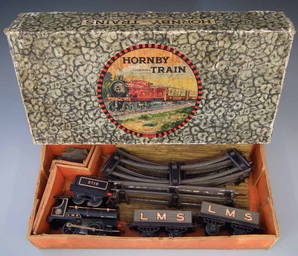 Hornby No. "O" clockwork tin plate goods train set. Condition report: see terms and conditions
