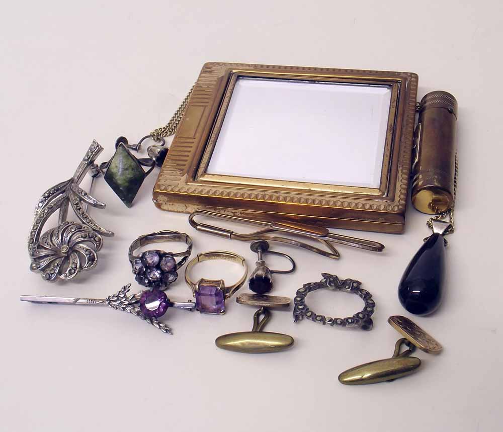 Collection of dress jewellery including 9ct gold ring set with amethyst, 1950 "Mirror-Go-Round"