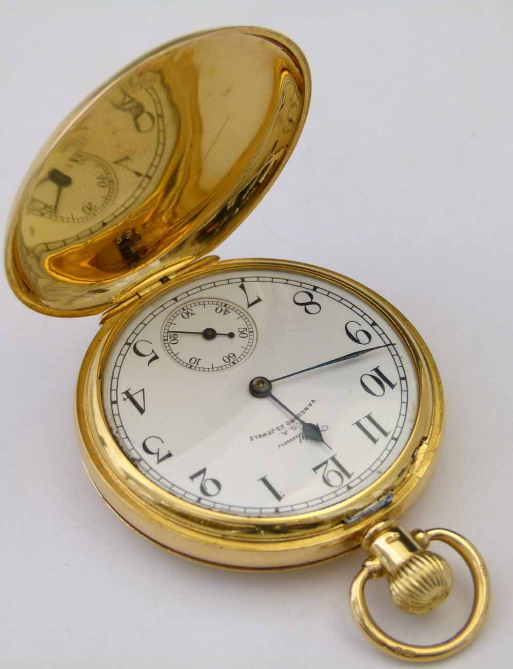 Waltham Vanguard 18ct gold cased hunter pocket watch, case Birmingham 1935, 47mm, white enamel