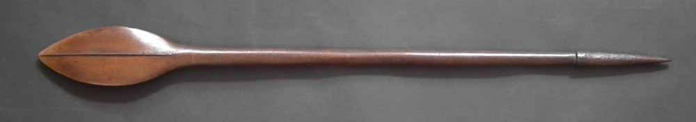 Oceanic Solomon Islands war club  the brown hardwood paddle shaped blade carved with a central