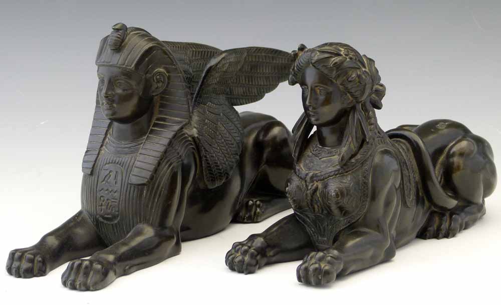 Patinated spelter pair of figures of a Greek and an Egyptian sphinx, length 26cm, 22cm. Condition