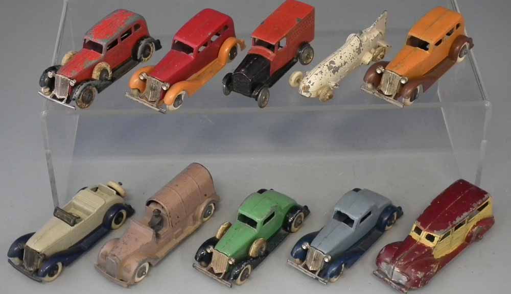 Ten early Tootsie Toy die cast toy vehicles.  (10) Condition Report:  Playwear and paint chipping to