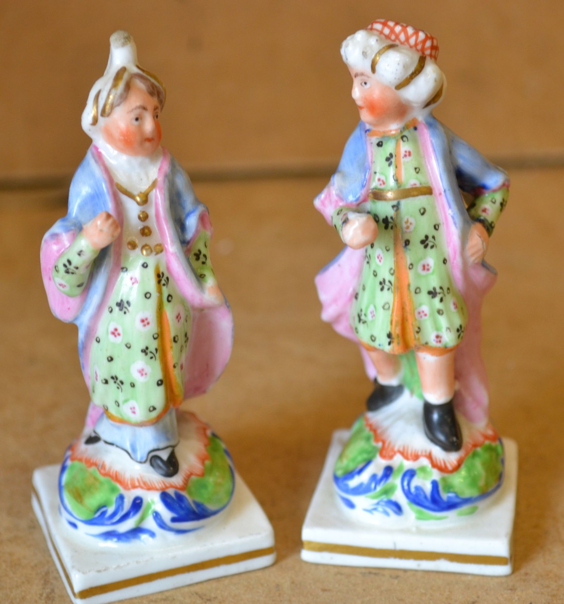 A Pair 19th Century Small China Figures of eastern lady and gentleman on square bases, 9cm high