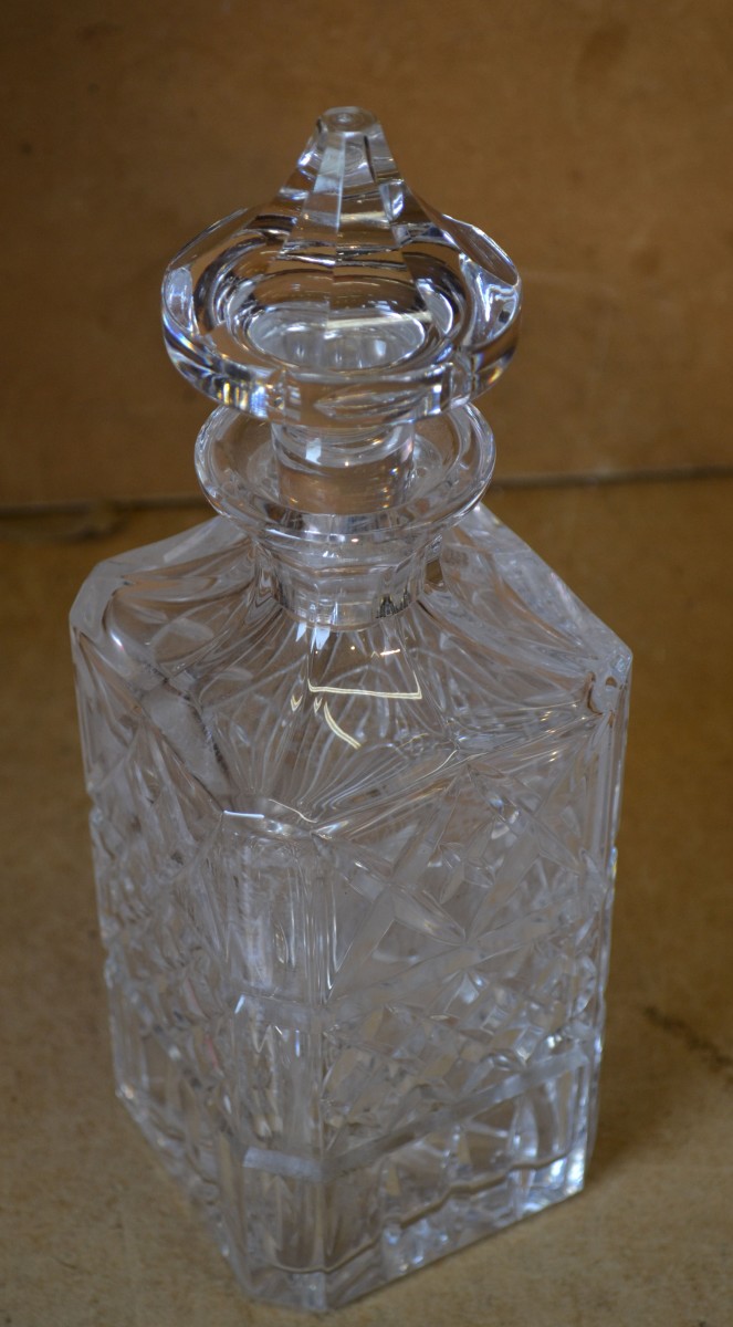 A Cut Glass Square Decanter with stopper, 26cm high