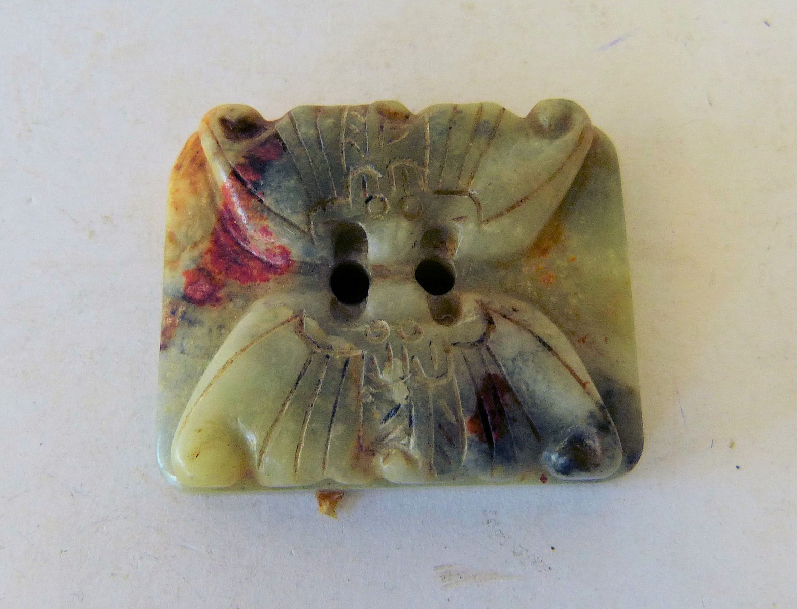 A Hardstone Netsuke in form of 2 bats on rectangular shaped base, 5cm wide