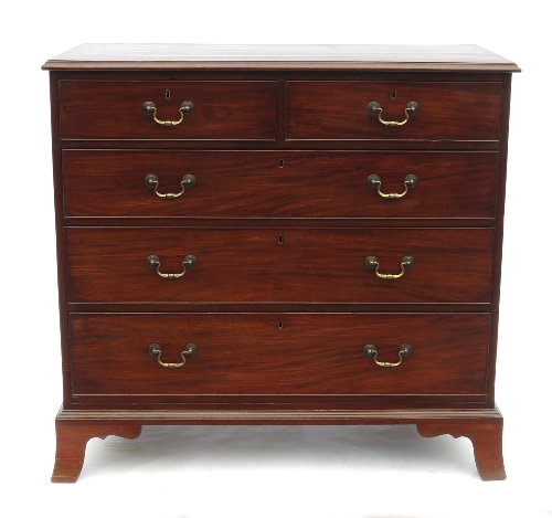 A late Georgian mahogany chest, fitted two short drawers over three graduated long drawers, raised