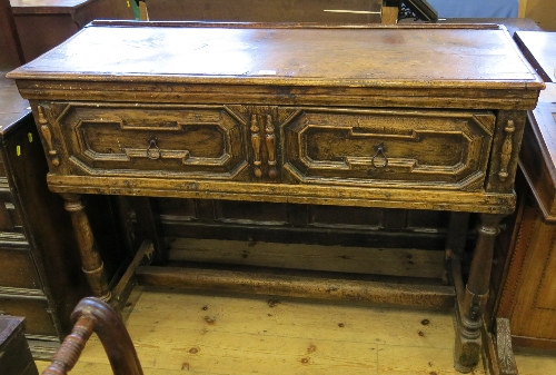 An Antique oak sideboard, or short dresser, fitted one long drawer formed as two short moulded front