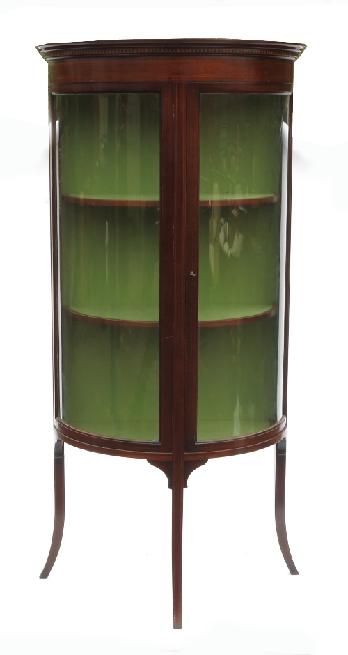 A demi lune display cabinet, with single glazed door, opening to reveal three fitted shelves, raised