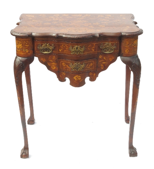 A Dutch marquetry side table, fitted with drawer to the serpentine shaped front with further drawers