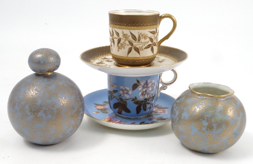 Two 19th century Royal Worcester cabinet cups and saucers, the one decorated with flowers and