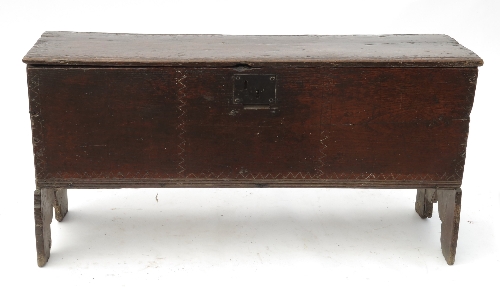 An 18th century oak six plank coffer, with plain rising lid, width 41.5ins