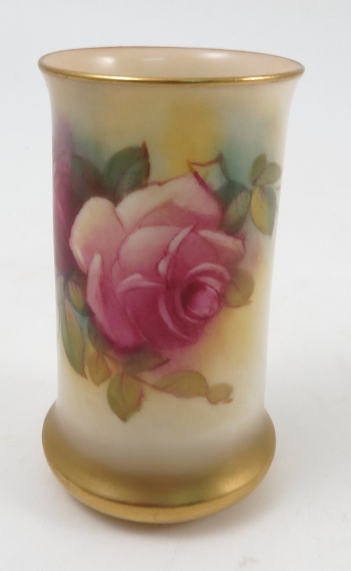 A Royal Worcester cylindrical vase, decorated with hand painted roses by M Hunt, shape number