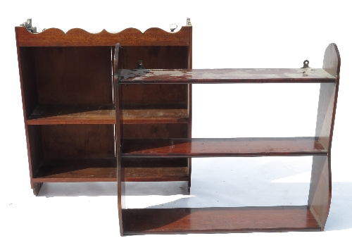 A set of 19th century mahogany hanging shelves, fitted with two shelves with close boarded back
