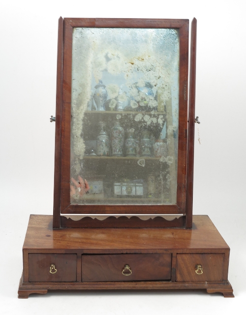 A 19th century mahogany dressing table mirror, the rectangular plate with stringing to the frame,