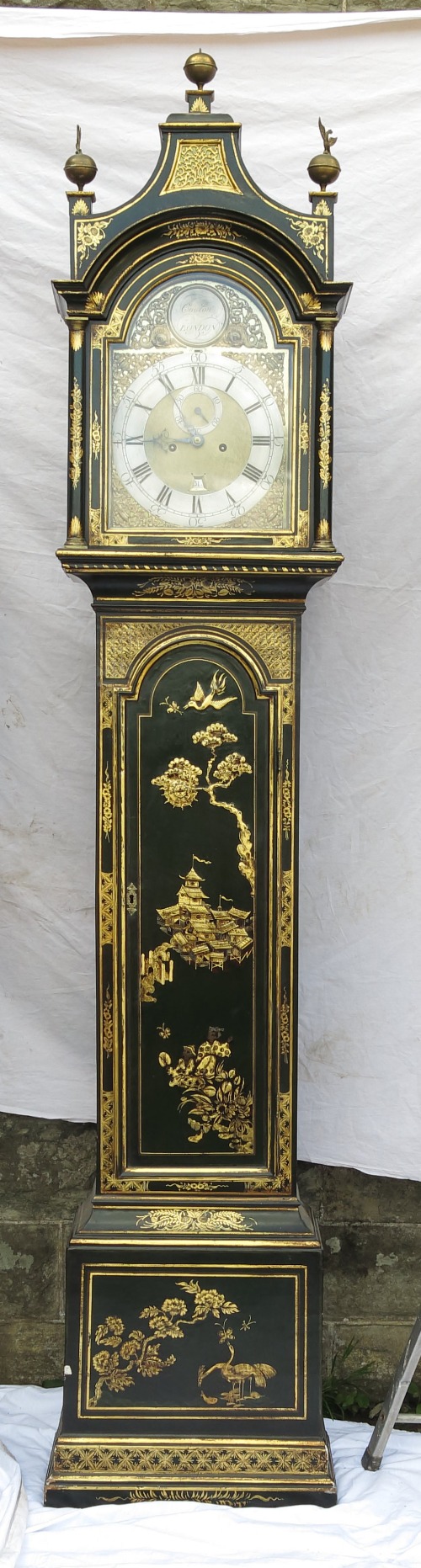 An 18th century green lacquered longcase clock, the arched face dial signed Coulon, London over