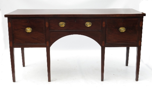 A 19th century mahogany sideboard, of rectangular form, with central drawer flanked by cellarette