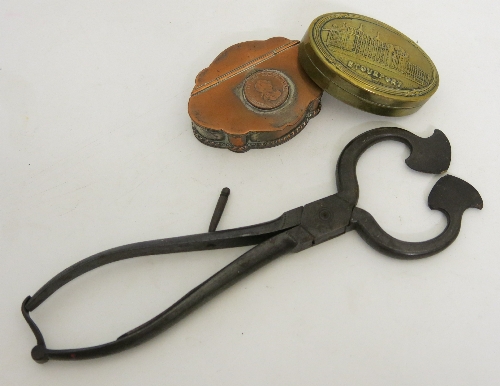 A pair of antique steel ice or salt cutters, of scissor action, together with an oval brass tin