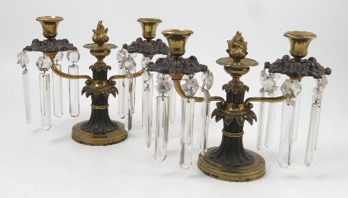 Two similar Regency gilt and metal lustre candlesticks, each with two branches, height 9.5ins