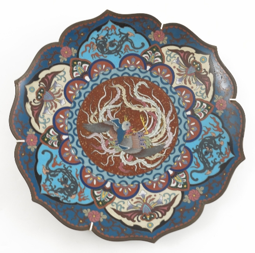 A cloisonne wall plate, the centre decorated with a cockerel, with shaped edge, diameter 12.25ins