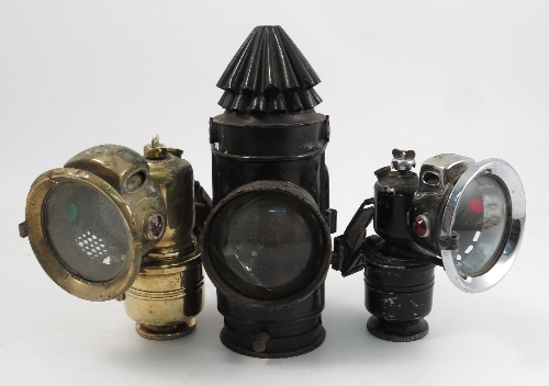 A quantity of lamps, to include a guards hand lamp, side lamps and motorcycle head lamps, makers