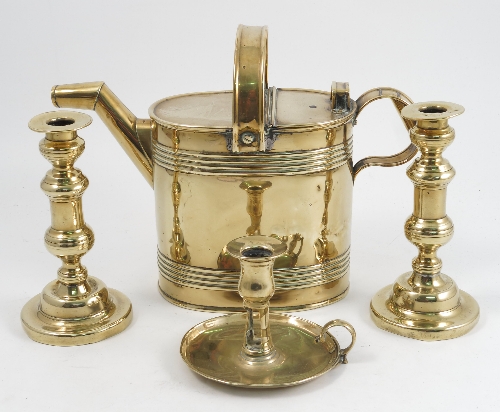 A quantity of brass ware, to include six pairs of candlesticks, a single candlestick, chamber stick,