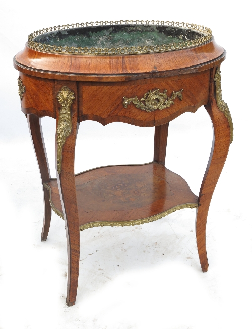 A late 19th century oval jardinière stand, with zinc liner, raised on four outswept legs,