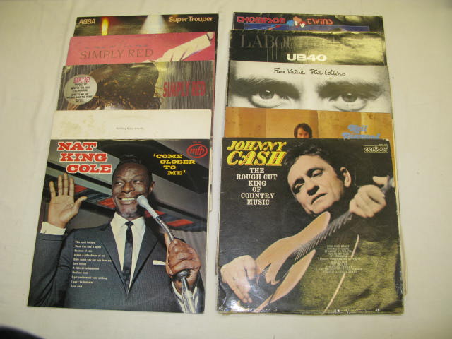 A Large Collection of LPs including Elvis, Nat King Cole, Johnny Cash etc