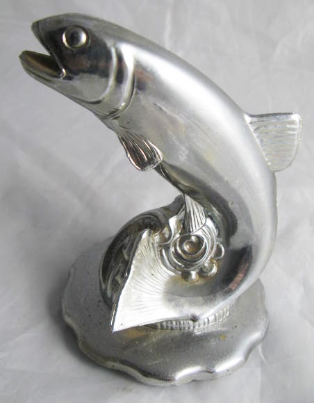 A Chrome Car Mascot in the form of a leaping salmon and mounted on radiator cap