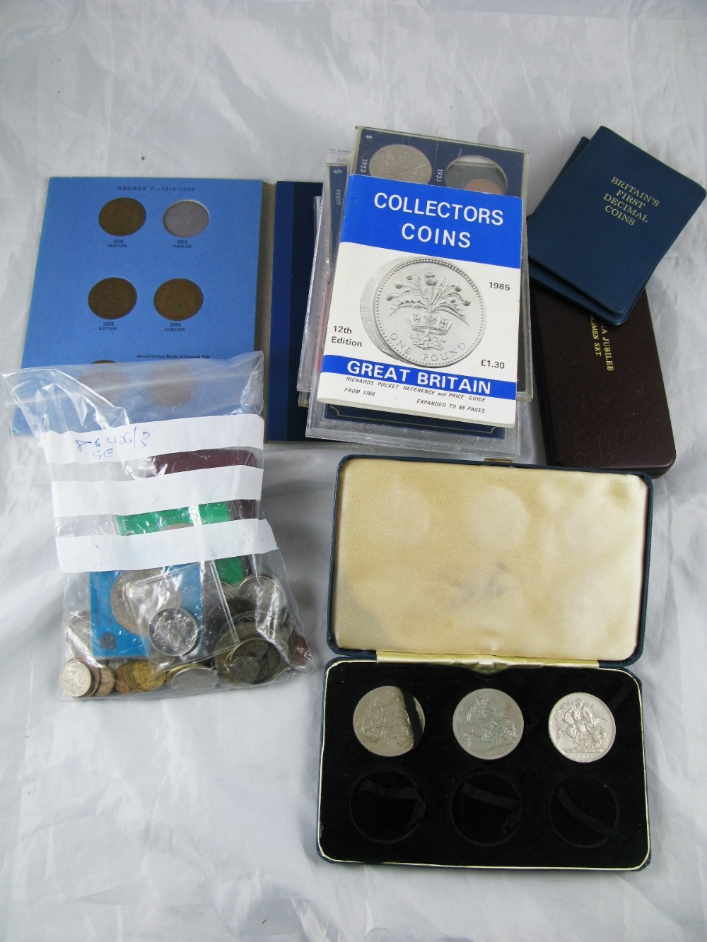 A Collection of coins in presentation packs