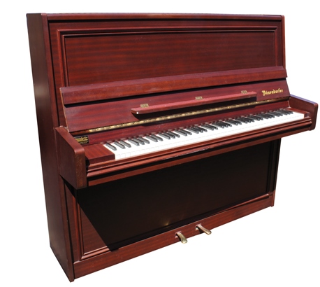 Bösendorfer (c1982)
An upright piano in a mahogany case.