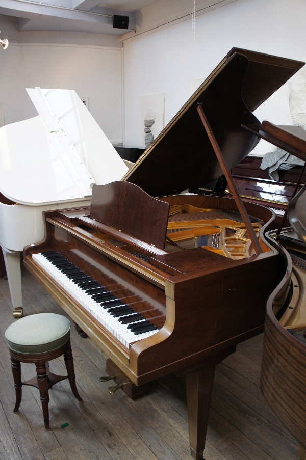 Blüthner (c1932)
A 4ft 11in 'baby' grand piano in a mahogany case on square tapered legs, together