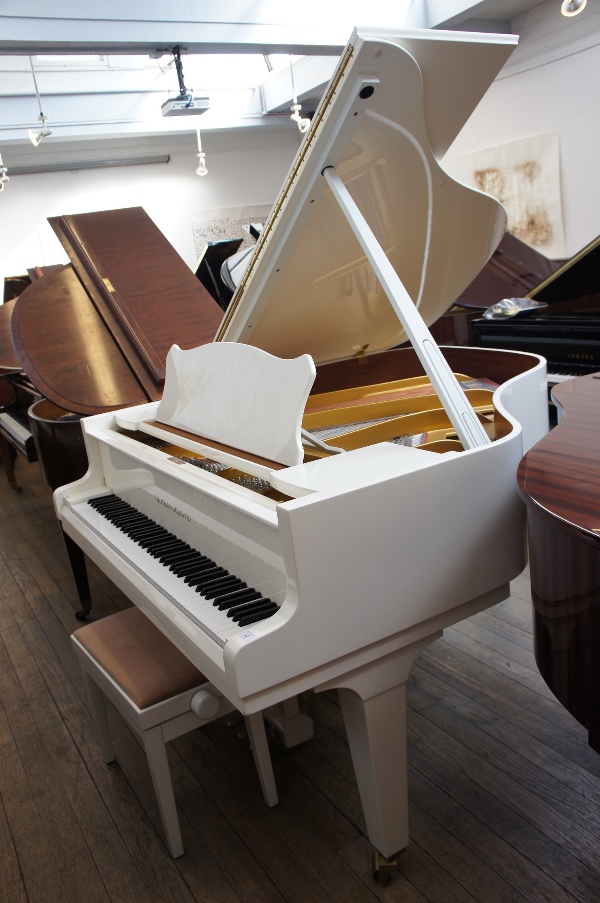 Grotrian Steinweg (c1989)
A 5ft 4in grand piano in a white case on square tapered legs, together