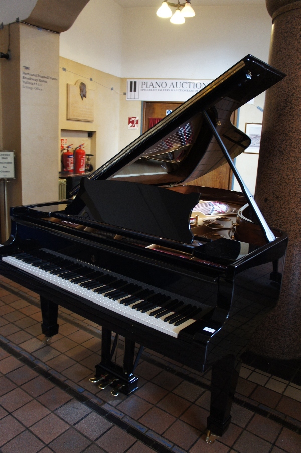 Steinway (c1971) 
A 7ft 5in Model C grand piano in a bright ebonised case on square tapered legs.