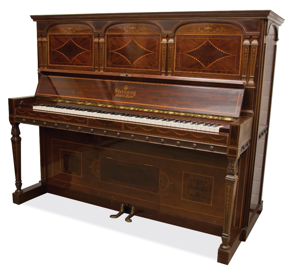 Steinway (c1911) 
A fine art-cased upright pianola; the mahogany case with inlaid urn, floral and