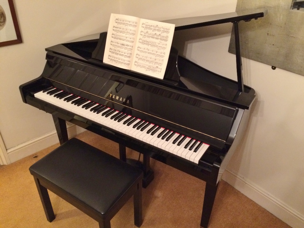 Yamaha (c1999)
A 3ft Model GT2 Grand Touch digital piano in a bright ebonised case, together with