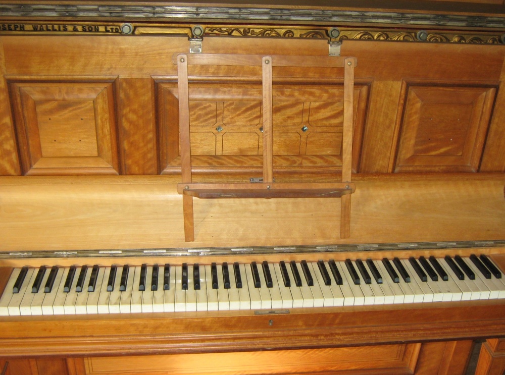 H Wallis and Son 
An overstrung upright piano in a satinwood and ebony strung case with decorative - Image 3 of 4