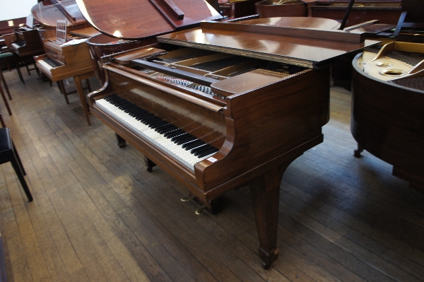 Steinway (c1927)
A Model M grand piano in a mahogany case on square tapered legs. NB There is no