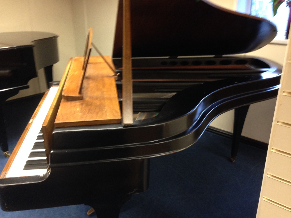 Rippen (c1960s)
A 6ft 1in rare aluminium framed grand piano in an ebonised and lightwood case on